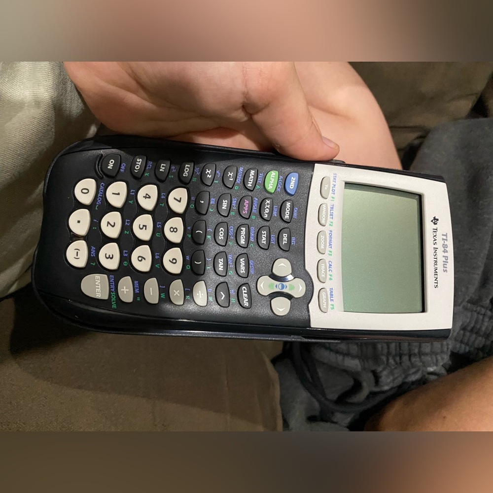 TI-84 Graphing Calculator with Black and White Design